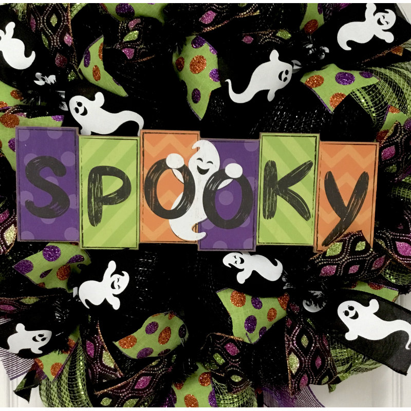 Couronne d'Halloween avec Spooky écrit en blocs colorés