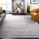 Riebe Abstract Ivory/Silver Area Rug
