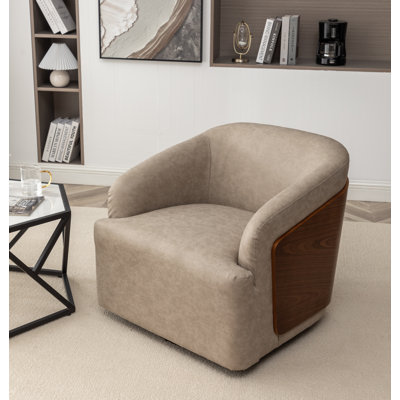 Fauteuil demi-tonneau pivotant en similicuir Broderic