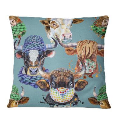 Coussin coloré à imprimé de taureaux colorés sur fond bleu