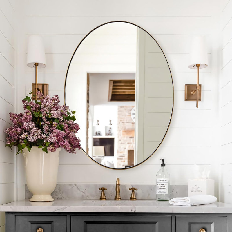 Miroir de salle de bain Kaitlee Cadre en acier inoxydable, 32 po x 24 po, Or brossé, Ovale et ronde
