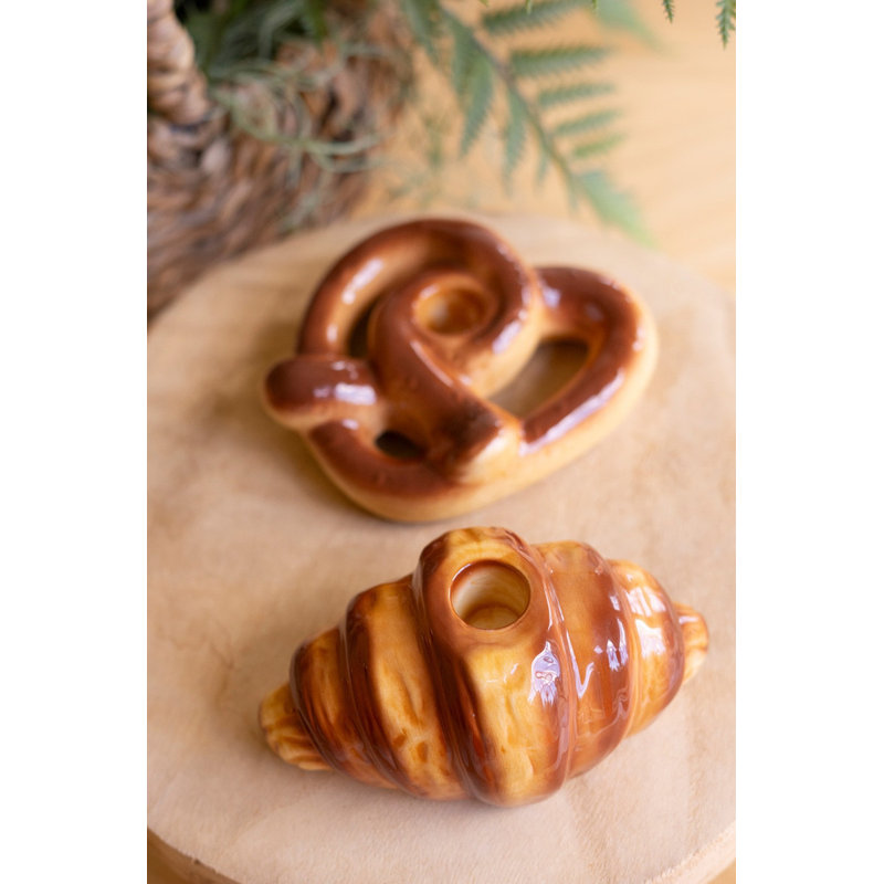 ENSEMBLE DE DEUX PORTE-BOUGIES EN CROISSANT ET EN CÉRAMIQUE