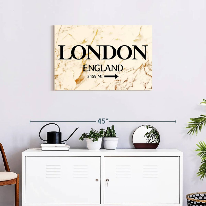 Enseigne Nicci London, H 20 po x l 30 po
