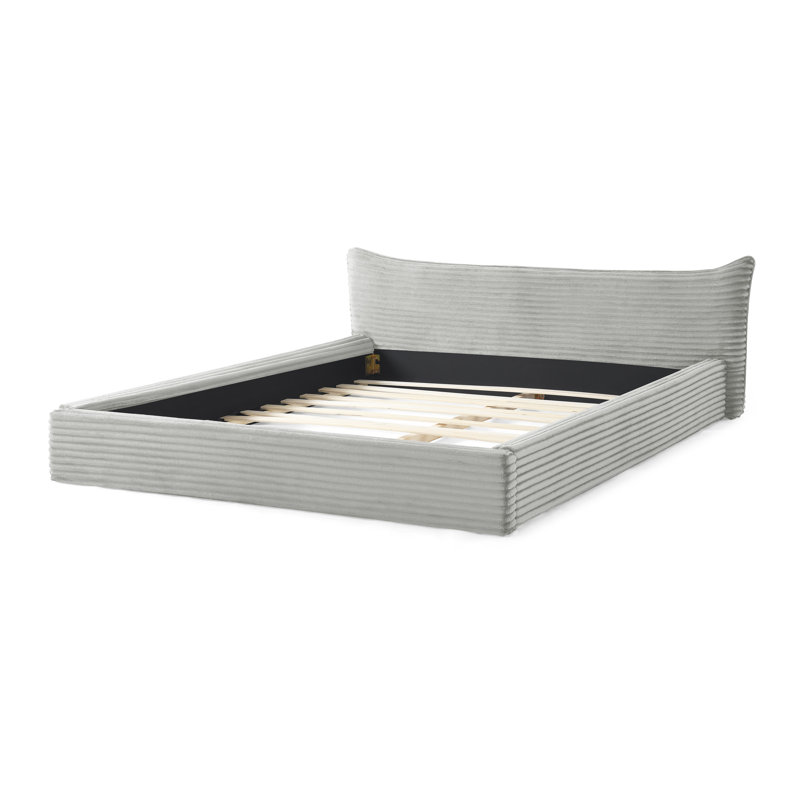Grand lit plateforme tapissier avec tête de lit courbée, tissu en velours et structure en bois massif