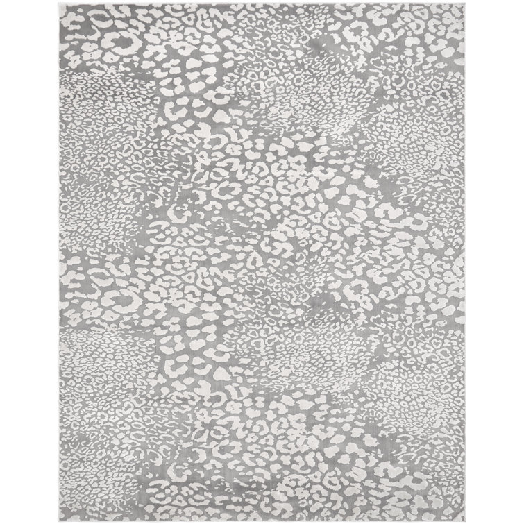 Tapis gris / ivoire à imprimé animal