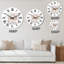Horloge murale moderne avec formes tropicales organiques et feuilles tropicales I-465663703