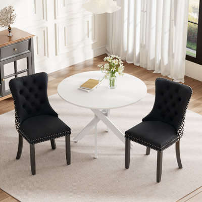 Ensemble de salle à manger rond en bois avec chaise capitonnée
