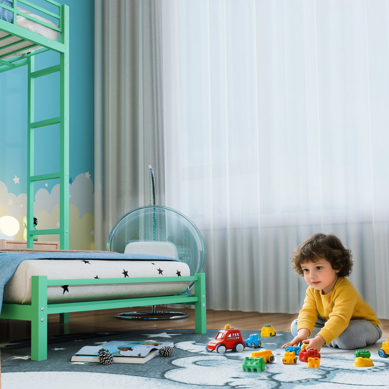 Lit mezzanine simple au-dessus de métal avec bureau, tiroirs et garde-corps, espace pour les chambres d'amis