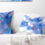Coussin à imprimé floral bleu clair et mauve