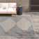 Calliah Striped Polypropylene Area Rug in Blue/Cream
