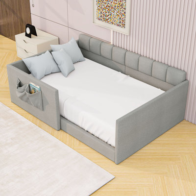 Upholstered Daybed with High Side Panels and Storage Pockets