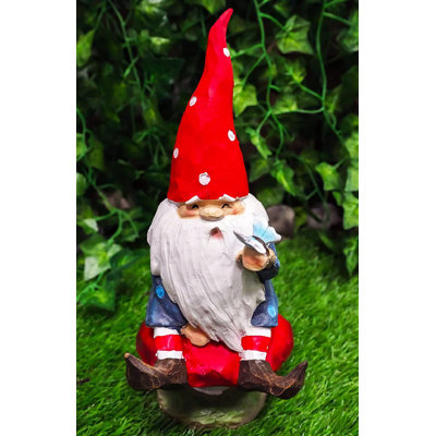 Gnome festif utilisant un champignon de champignon