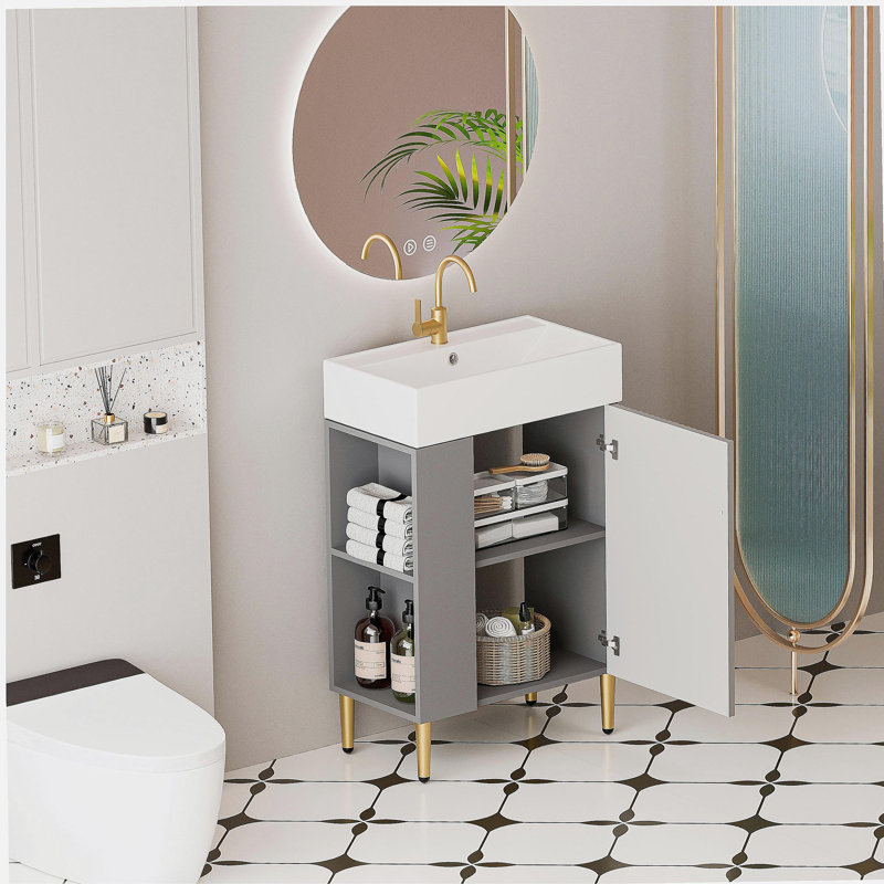 Le meuble-lavabo à tablette ouverte avec lavabo en céramique et porte à fermeture en douceur, avec une armoire de rangement à tablette ouverte à gauche, nécessite un assemblage