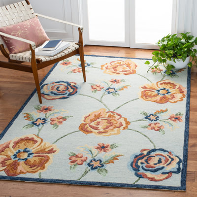 Tapis floral ivoire / orange en laine touffeté à la main Floral