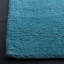 Tapis en laine turquoise touffeté à la main Moreau-1561270976