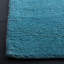 Tapis en laine turquoise touffeté à la main Moreau-1561270988