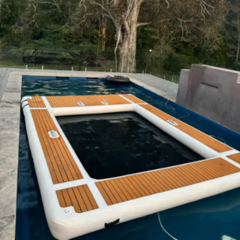 Portable inflatable floating ocean pool with net, yacht slide dock platform