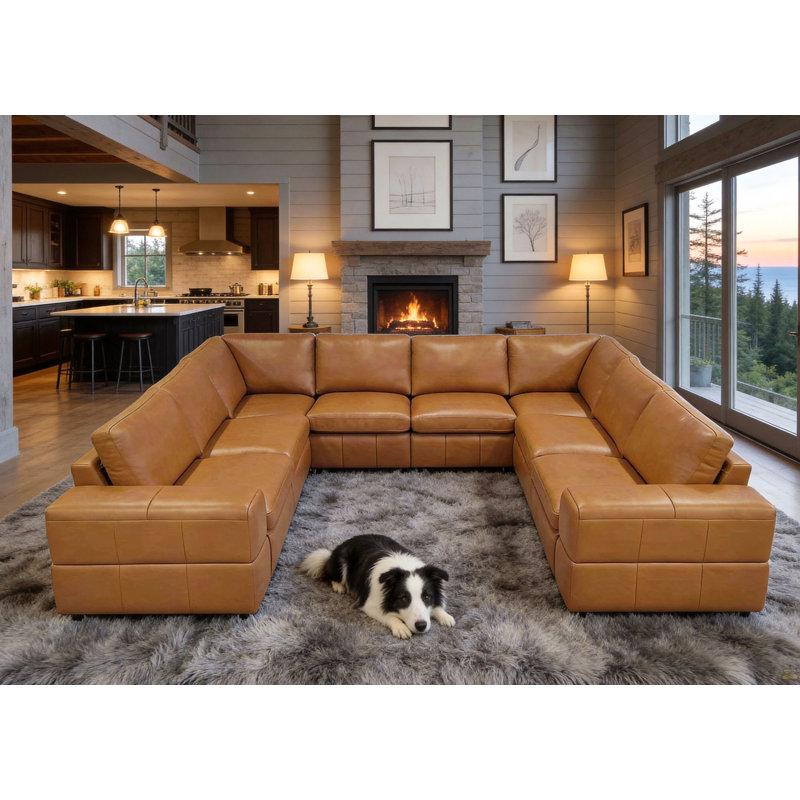 Canapé modulaire à large accoudoirs en cuir assorti