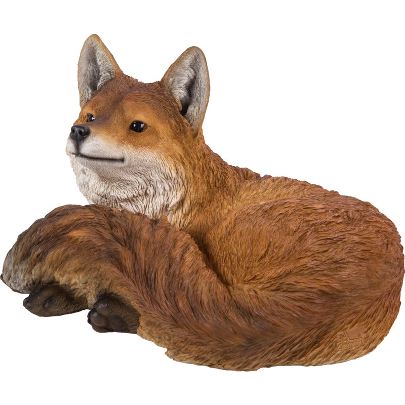 Statue renard allongé