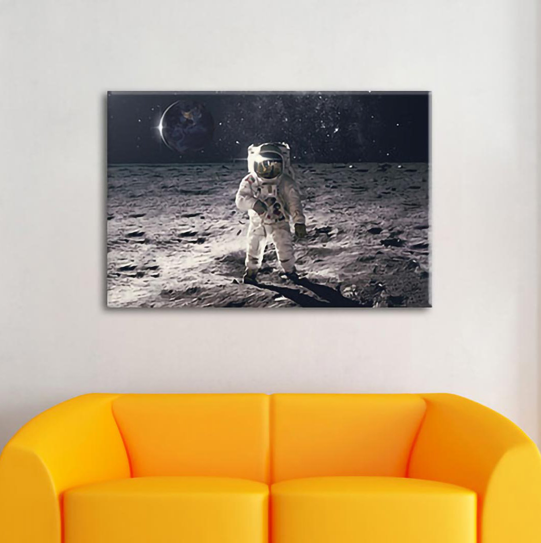 Leinwandbild Einsamer Astronaut auf dem Mond