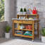 Banc de rempotage en acacia Anjenette-1170349116