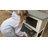 2-Story Rabbit Hutch with Wheels, Wooden Bunny Cage with 2 Pull-Out Trays and Waterproof Roof