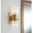 2-light Modern Brass Sconce With Ribbed Glass Shades