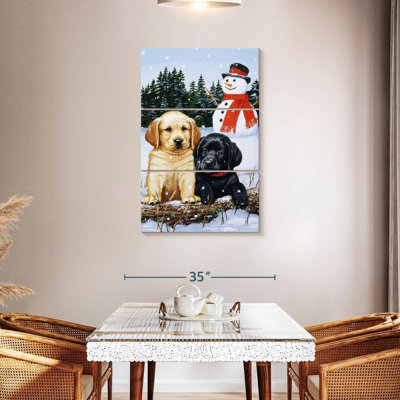 Chiots Brampt Lab avec bonhomme de neige
