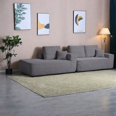 Canapé modulaire moderne gris avec méridienne en tissu moelleux pour la maison