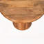 Table basse sur piédestal en bois sculpté
