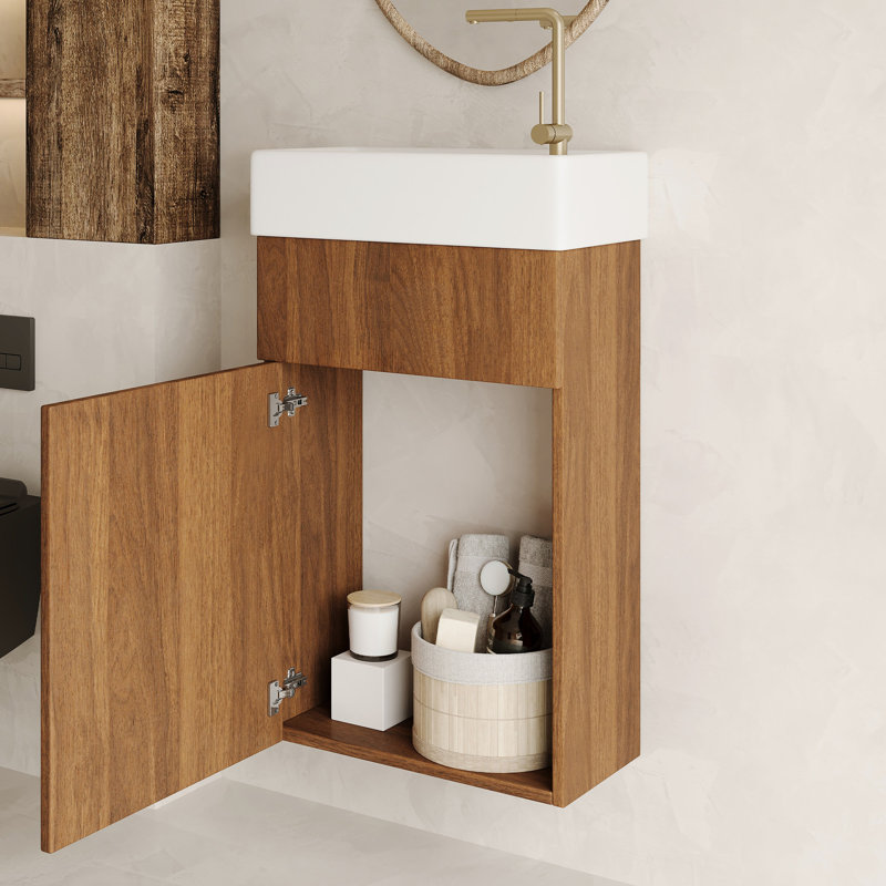Meuble-lavabo suspendu de 42 cm (16,5 pouces) avec lavabo en céramique, porte et bonde réglable, idéal pour les petits espaces. Style moderne du milieu du siècle, rangement intégré, fermeture amortie.