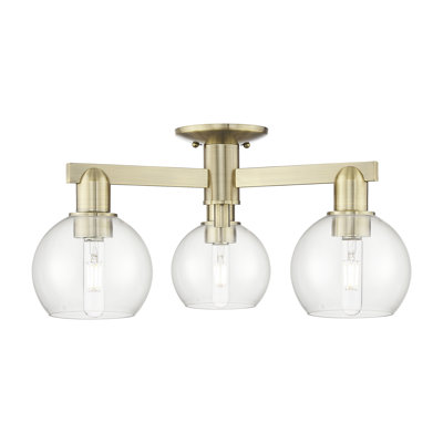 Arcadia - Amberle - 3 Light 23" Semi-Flush Mount - Antique Brass Finish - Clear Shade
