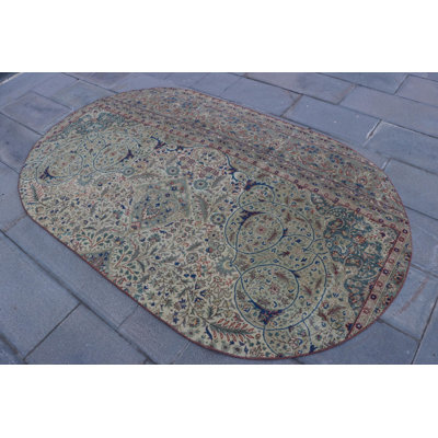 Tapis rond rétro Oushak - vert et coloré, idéal pour la cuisine