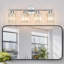 Applique murale verticale Kyneisha moderne chromée à 4 lumières en cristal, à placer au-dessus du miroir de la coiffeuse ou du lavabo ; compatible avec les ampoules à intensité variable (ampoules non comprises).-240086460-240086461