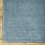 Tapis en viscose / laine touffeté à la main de couleur turquoise Dishaun-747556221