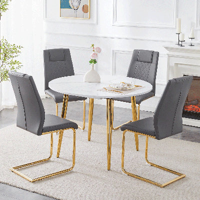 Round Dining Table Set For 4–6, 42"-54"Expandable Marble Dining Table With Gold Metal Legs And PU Leather Upholstered Chairs,Ideal Dining Space For Small Apartments.