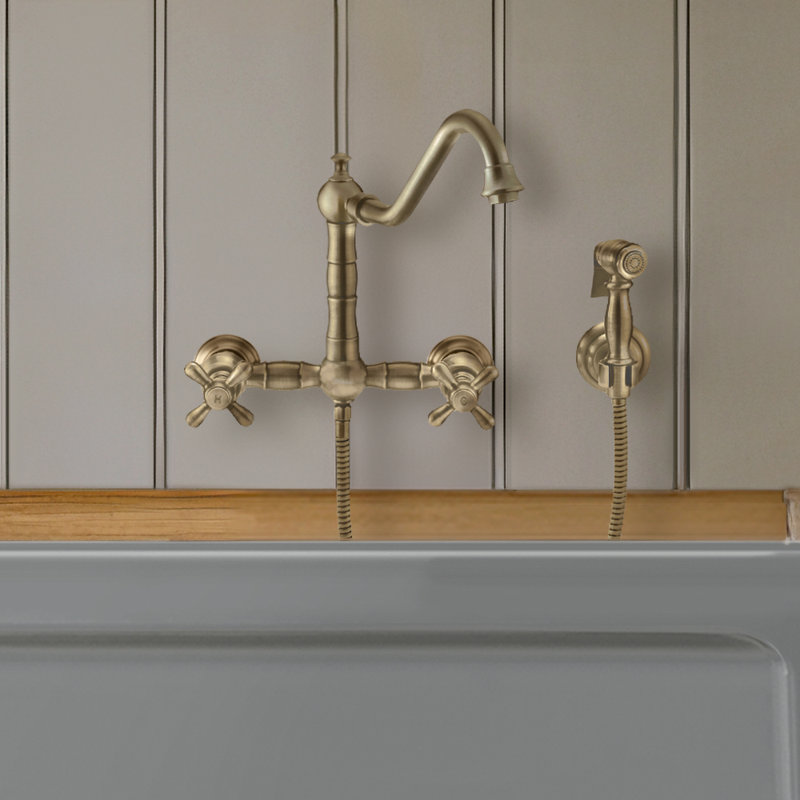 Whitehaus Wall Mount Faucet with Long Traditional Swivel Spout and Solid Brass Side Spray, Antique Brass, Cross