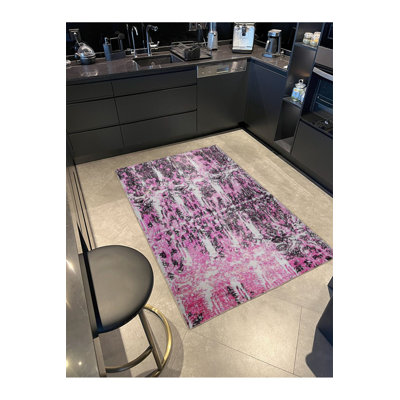 Tapis décoratif tissé mauve à rayures multicolores