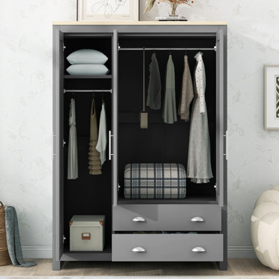 Armoire de rangement à trois portes avec armoires et deux tringles de suspension