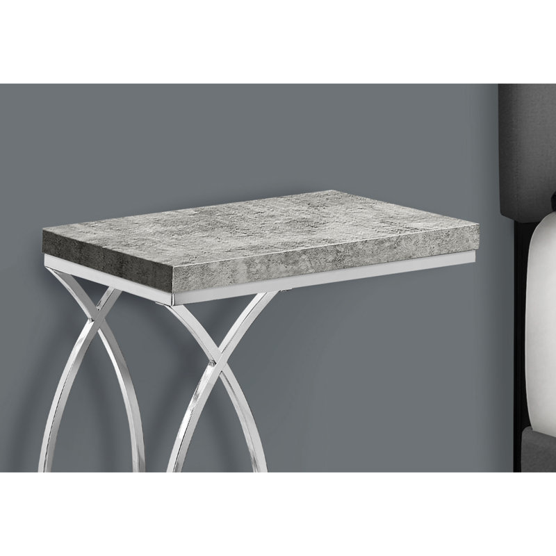 La table d'appoint contemporaine de couleur grise apporte une touche d'élégance à votre espace