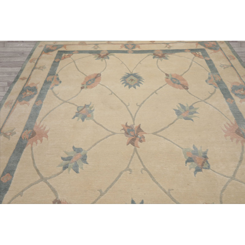 Tapis tufenkian en laine noué à la main ivoire 8 x 10 8 pi