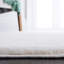 Tapis en fausse fourrure de lapin 500 en blanc cassé-1668846370