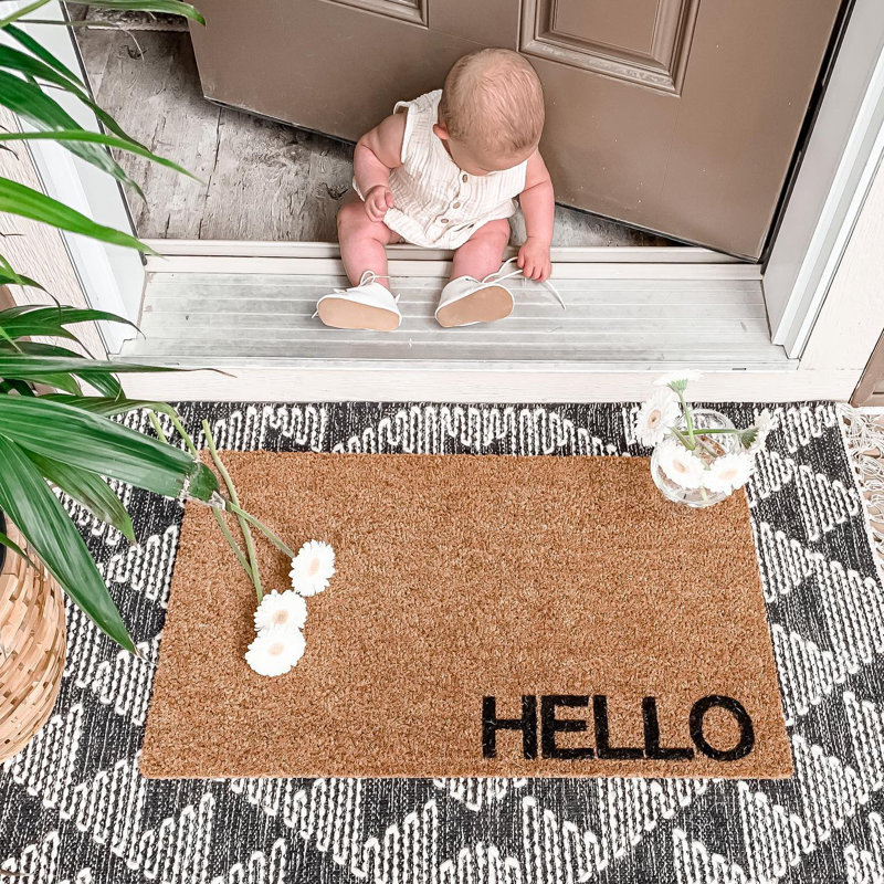 Tapis d'extérieur antidérapant Evangéla Hello 36 po x 22 po