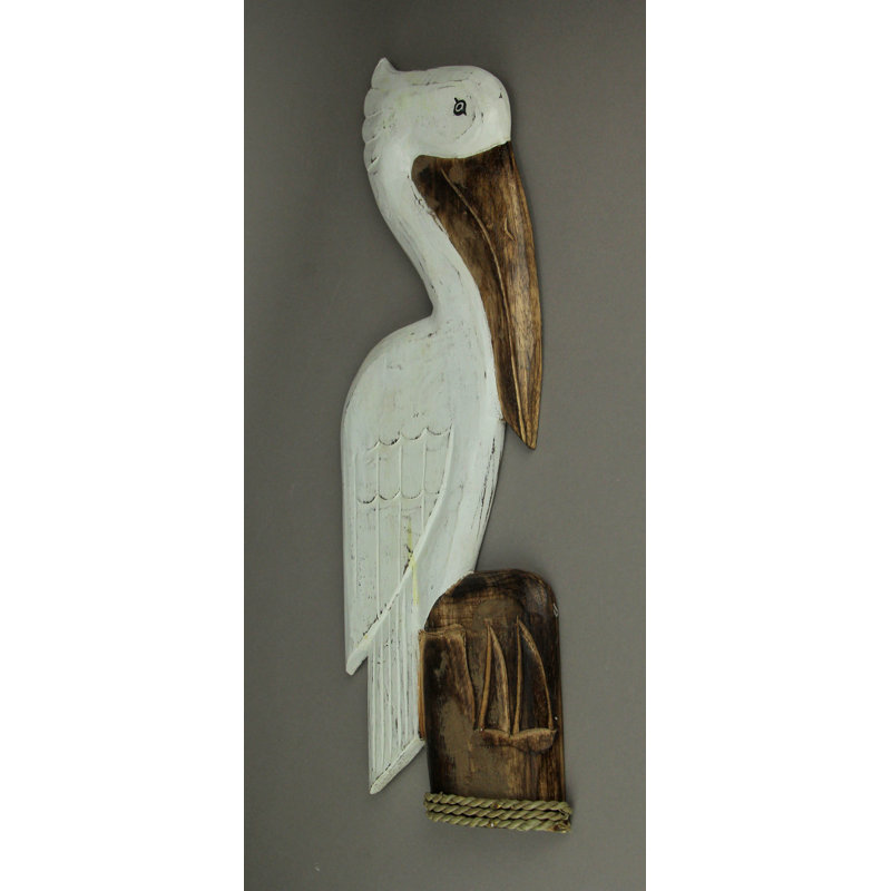 Coastal white and brown wood perched pelican wall sculpture on nautical piling — 23.5" H x 7.75" L x 1" W