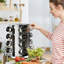 Étagère à épices pivotante à 360 degrés avec 16 pots en verre rechargeables, carrousel de comptoir en acier inoxydable pour le rangement des assaisonnements de cuisine