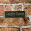 Rochon Naughty Corner Metal Door Sign