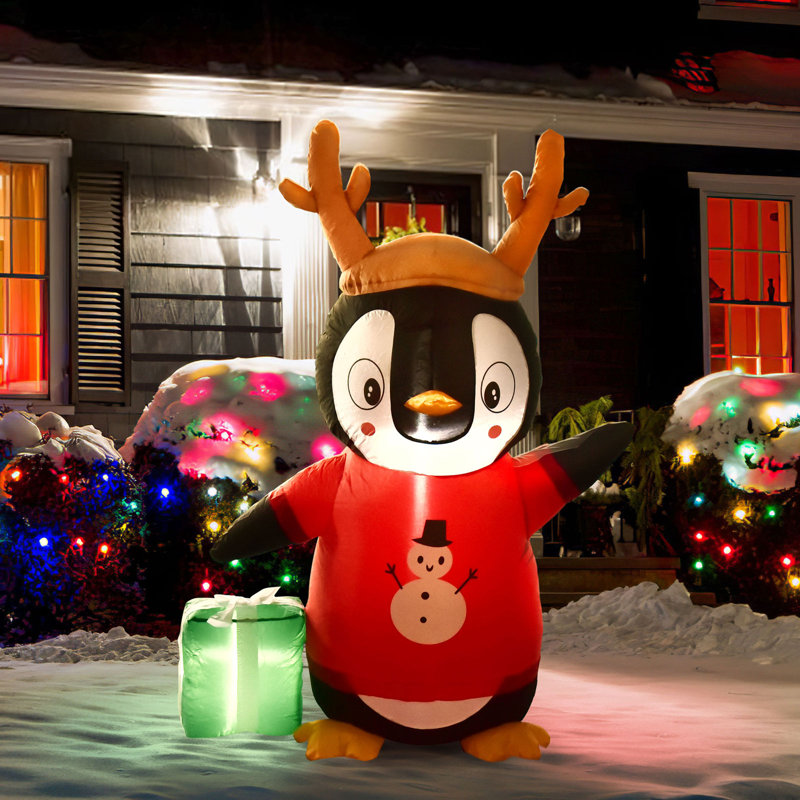 Pingouin cadeau avec sac de renne gonflable
