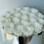 Arrangement floral rose en boîte