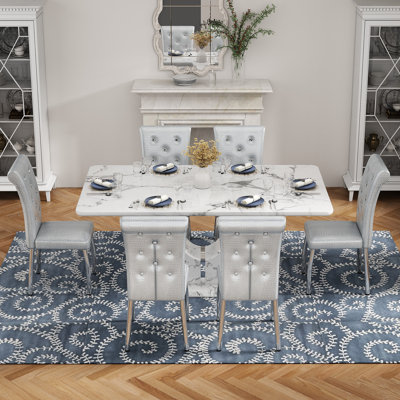 Ensemble de table de salle à manger 63 po en simili marbre avec chaises en similicuir et coussin souple enveloppé de ressorts