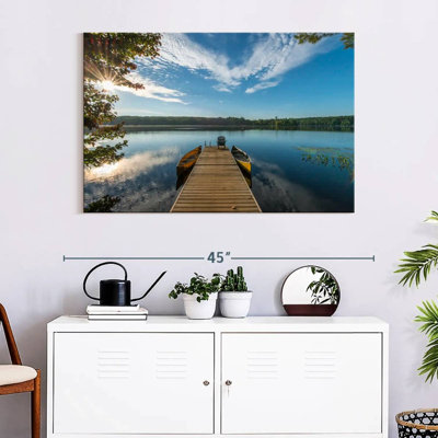 Dock on placid lake Aletra
